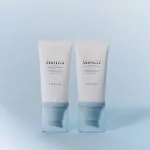 Two SKIN1004 Centella Water-Fit Sun Serum tubes side by side